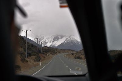 Road seen through car window