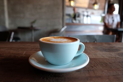 Coffee cup on table