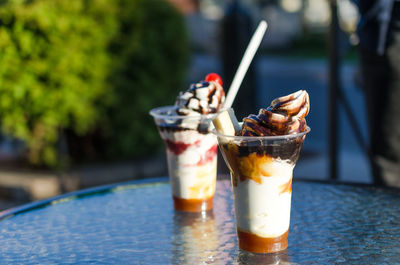 Close-up of ice creams on table