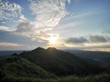 Scenic view of mountains against sky during sunset