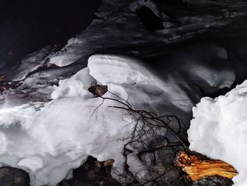 Scenic view of snow covered rock