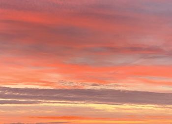 Low angle view of dramatic sky during sunset