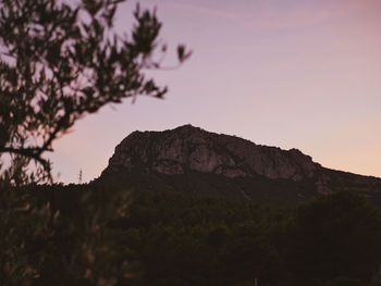 Scenic view of mountains against sky during sunset