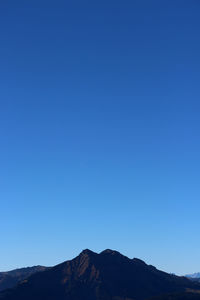 Scenic view of mountains against clear sky
