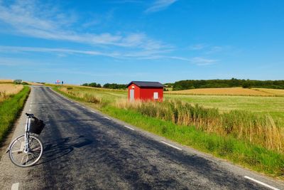 Empty country road along landscape