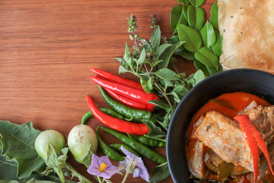 High angle view of chopped vegetables in bowl on table