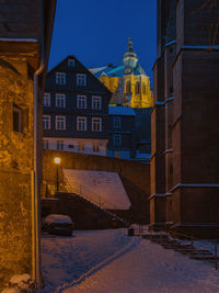 Buildings in city during winter