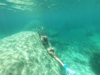 Man swimming in sea