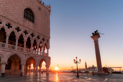 Palace at st mark square against sky during sunrise
