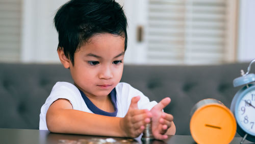 Portrait of cute boy at home