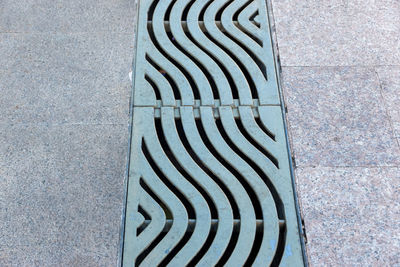 High angle view of manhole on road