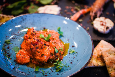 High angle view of meat in plate on table