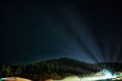 Scenic view of illuminated star field against sky at night