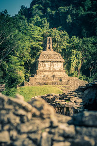 View of temple against trees