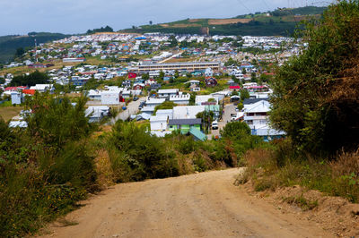 Road amidst buildings in town