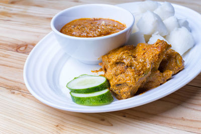 Close-up of served food in plate