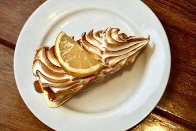 High angle view of cake in plate on table