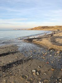 Scenic view of beach against sky