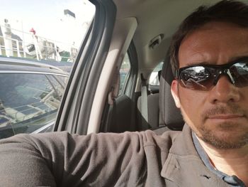 Portrait of man in car