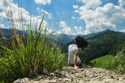 Scenic view of landscape against cloudy sky