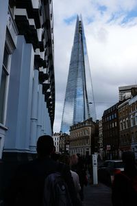 Modern buildings in city against clear sky