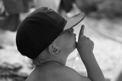 Close-up of woman wearing hat