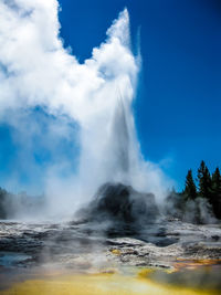 Geyser spraying at yellowstone national park