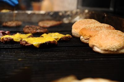 Close-up of person preparing food on table