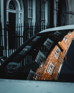 Reflection of a building in the windscreen