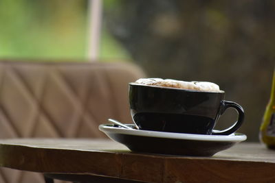 Close-up of coffee on table