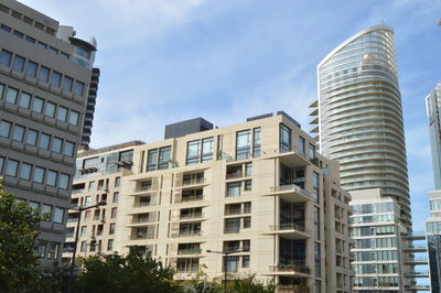 Low angle view of modern building against sky