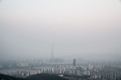 Modern buildings in city against sky