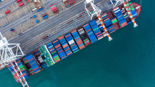Aerial view container ship working at seaport, global business company import export logistic