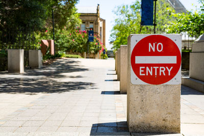 Road sign on street in city