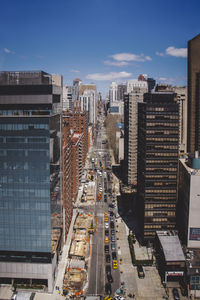 Modern buildings in city against sky