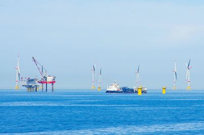 Ship in sea against sky