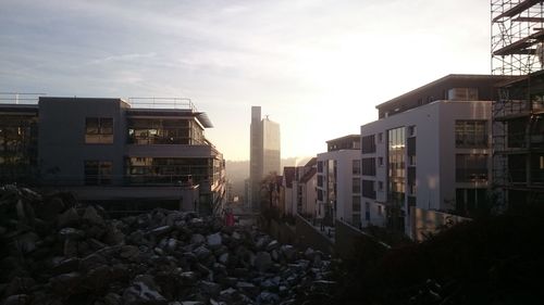 View of buildings in city against sky