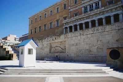 Exterior of historic building in city against sky