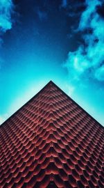 Low angle view of built structure against blue sky