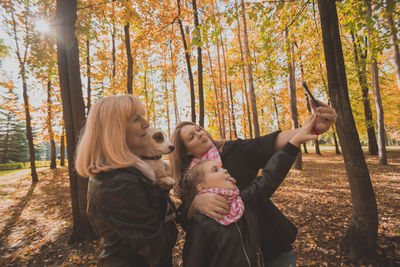 Young woman in forest during autumn