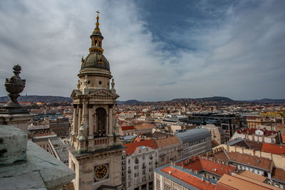 High angle view of buildings in city against sky
