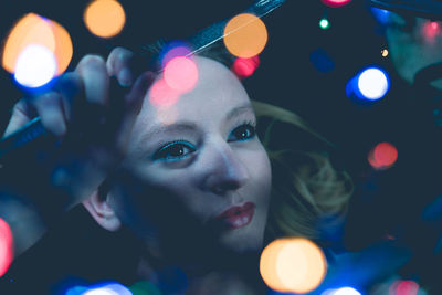 Portrait of young woman looking away