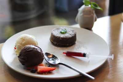 Close-up of dessert in plate on table