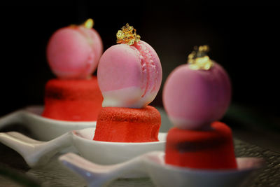 Close-up of candies against white background