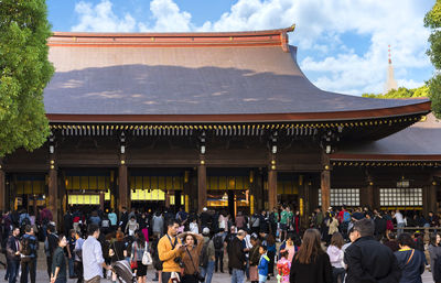 Group of people in temple against building