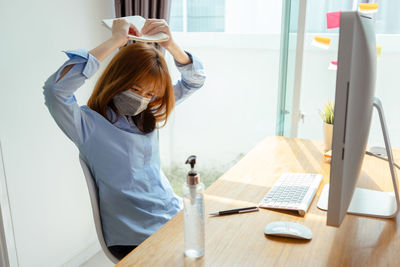 Woman working on table