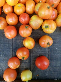 Directly above shot of tomatoes for sale at market stall