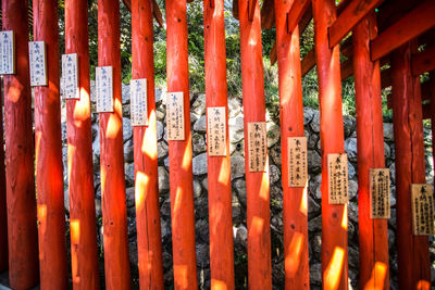 Panoramic view of temple against fence