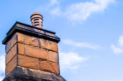 Low angle view of old building against sky