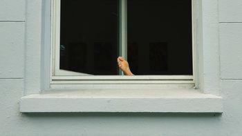 Man in window